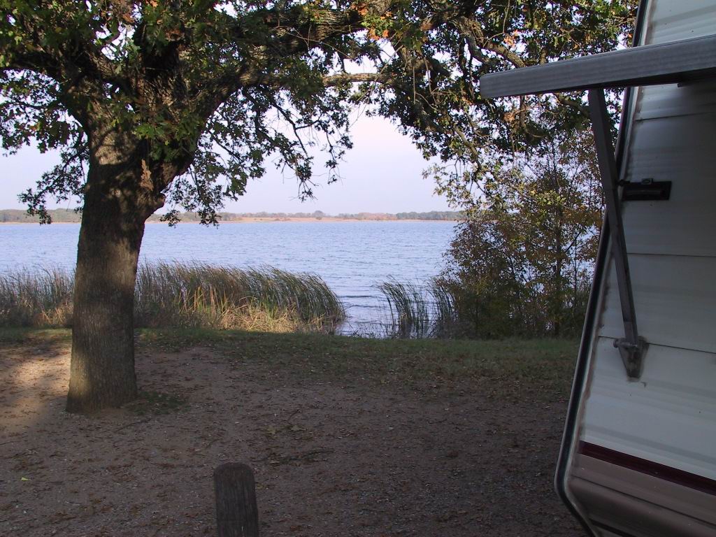 Jeanne standing by trailer